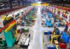 U.S. Tightens Jet-Parts Pressure on China Aerial view of a large industrial workshop filled with various machinery and equipment
