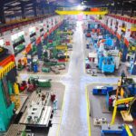 U.S. Tightens Jet-Parts Pressure on China Aerial view of a large industrial workshop filled with various machinery and equipment